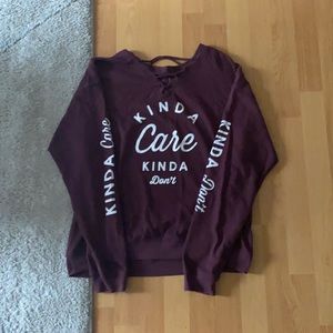 “Kinda Care Kinda Don’t” on shirt